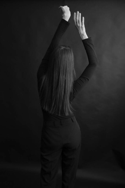 art photography, dancer expresses emotions through movement, body abstraction on black backgroun - Φωτογραφία, εικόνα
