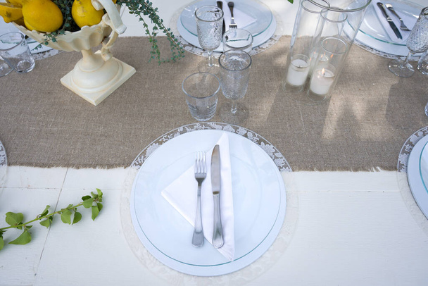 detail of place at the table on a laid table in the garden - Photo, Image
