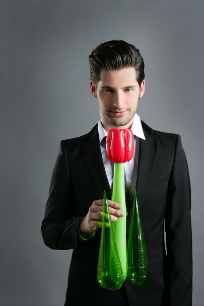 Businessman modern valentine rose flower in hand - 写真・画像