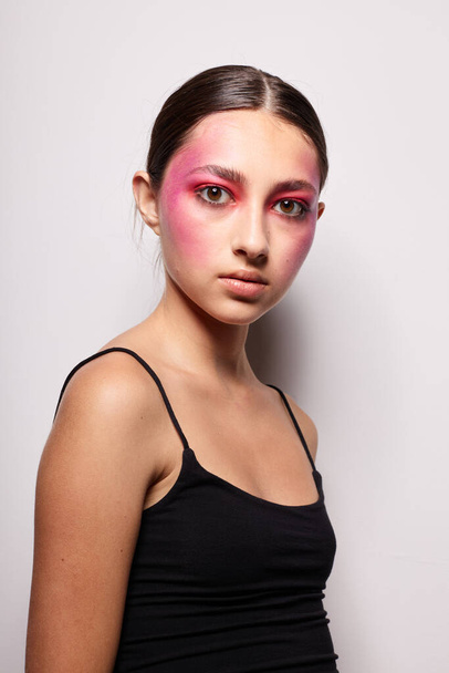 Young beautiful woman bright makeup posing fashion emotions isolated background unaltered - Valokuva, kuva