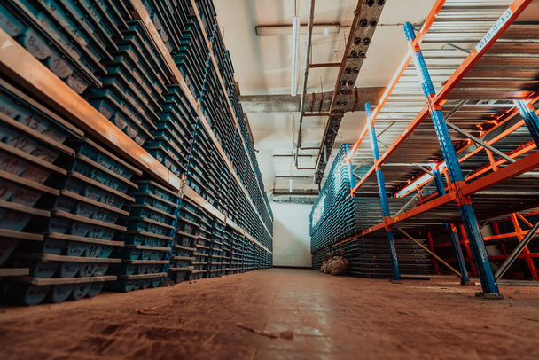 Gold mining storage rock core samples geology drilling industry. Large ore warehouse in modern industry, ores stacked in boxes. Selective focus. High-quality photo - Foto, Imagen