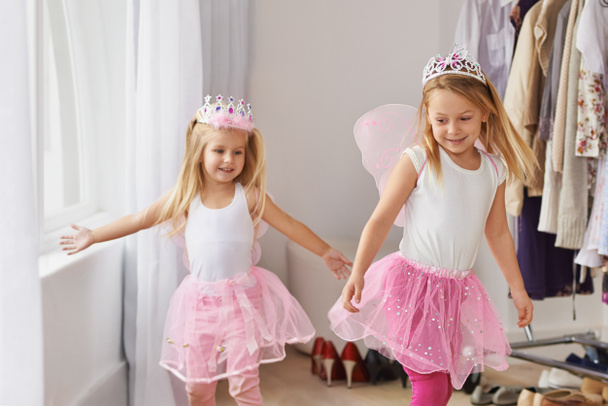 Having fun in imagination land. Cropped shot of little girls wearing fairy princess costumes. - Fotoğraf, Görsel
