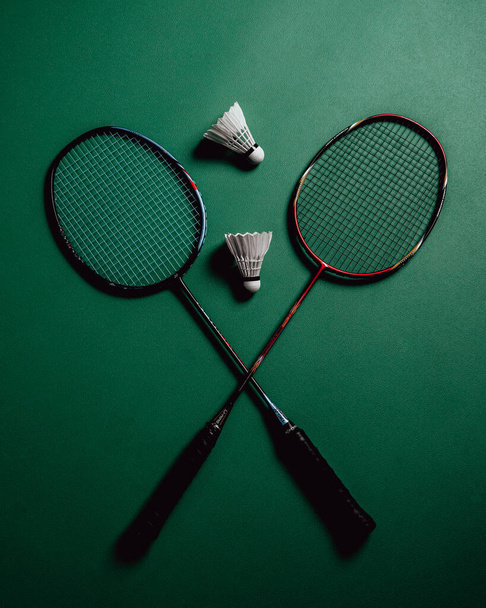 tennis racket and ball on green background - 写真・画像