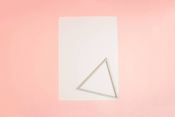 blank white envelope with pink background, top view - 写真・画像