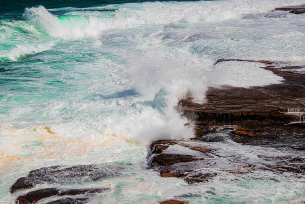 waves crashing on the beach - Fotó, kép