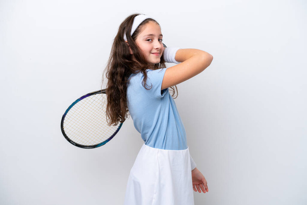 Little girl isolated on white background playing tennis - 写真・画像