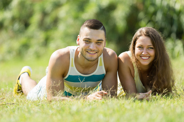 Girl and boyfriend in summer park - Fotoğraf, Görsel