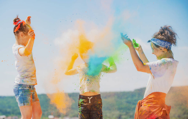 Funny kids in summer. Colored splash powder and color dust. - Fotografie, Obrázek