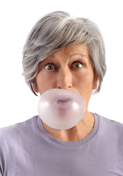 Adult Woman Blowing Chewing Gum - Photo, Image