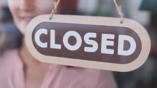 Small business opening up. Turning the sign from close to open. 4k 60fps - Footage, Video