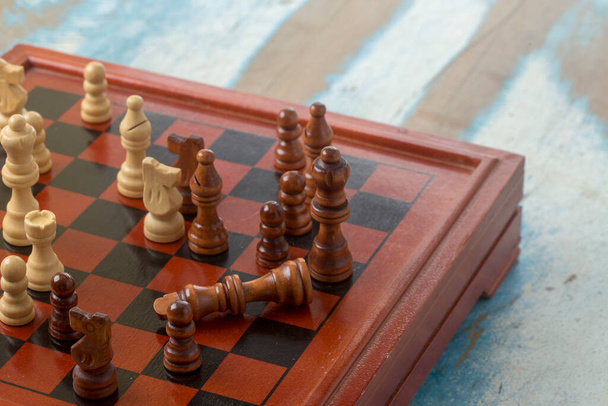 Top view of chessboard, with game finished by checkmate - Photo, Image