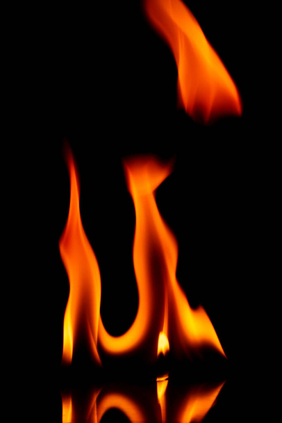 Fire flames isolated on a black background - Foto, immagini