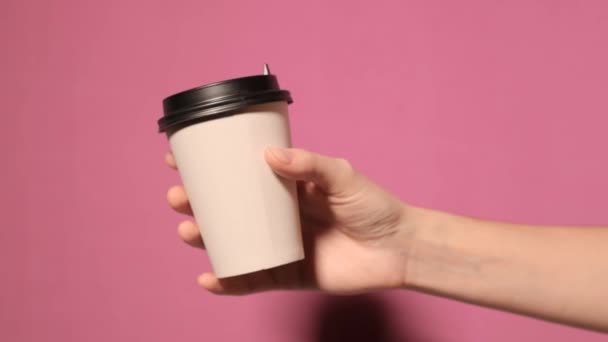 White paper cup with black lid. - Footage, Video