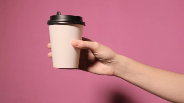 White paper cup with black lid. - Footage, Video