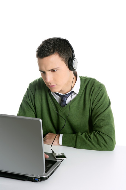 Young man student, computer, music headphones - Fotó, kép