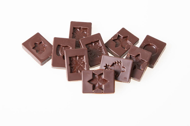 black chocolate square in top view in white background - Photo, Image