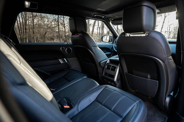Riga, Latvia - 26.02.2022. Interior of Land Rover Range Rover Sport 2019 year luxury car black color - Photo, image