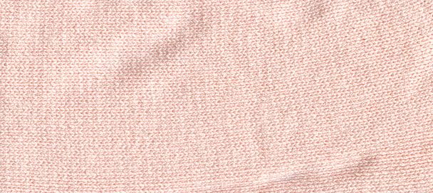Handmade knit fabric canvas texture in beige cream color. Cozy cream tone textile blanket close up. - Фото, зображення