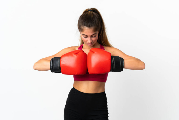 Young caucasian woman isolated on white background with boxing gloves - Photo, Image