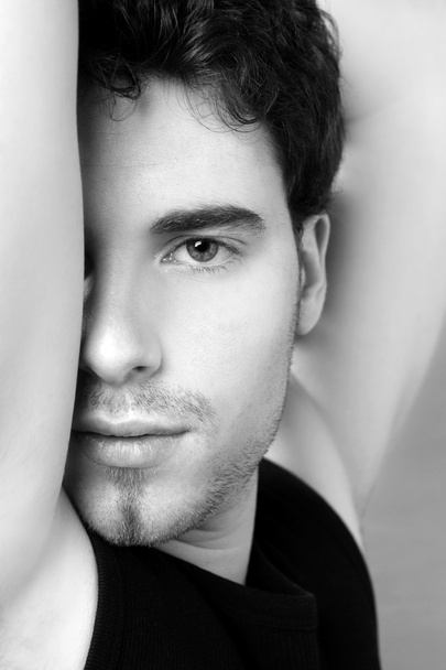 Black and white young man face portrait - Fotó, kép