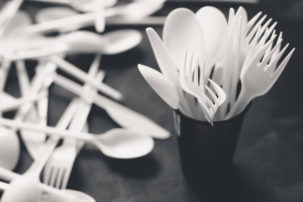 Disposable plastic cutlery, forbidden in European Union - Foto, imagen