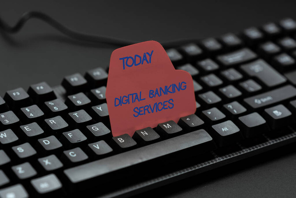 Hand writing sign Digital Banking Services. Concept meaning Business, technology, internet and networking Entering Image Keyword And Description, Typing Word Definition And Meaning - Photo, Image