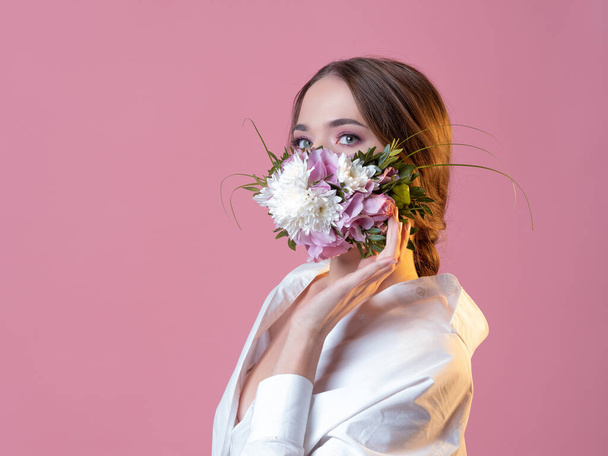 Young beautiful woman in a flower face mask, - Fotoğraf, Görsel
