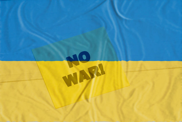 NO WAR in Ukraine concept. Ukraine flag background. Russian attack, world war - Photo, Image