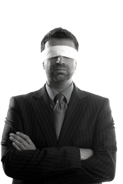 Blindfolded businessman over white background - Photo, image