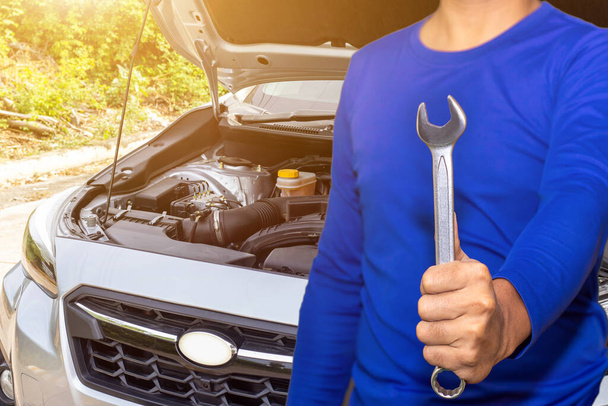Auto mechanic or driver checks steering and gear system and start system before driving at service station,change and repair before drive - Photo, Image