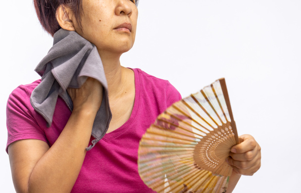 Mulher de meia-idade sentir ondas de calor ou superaquecida, sintomas da menopausa - Foto, Imagem