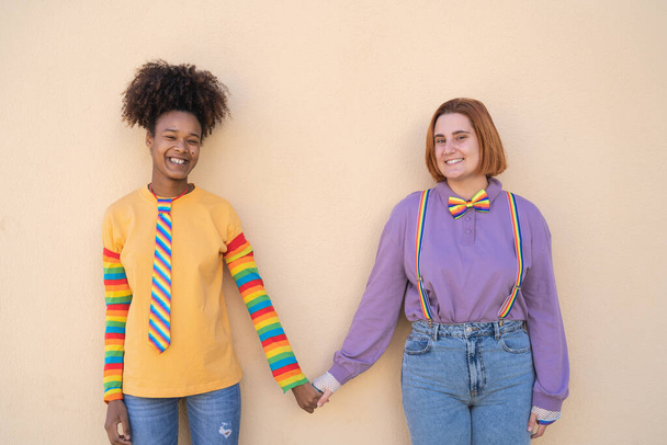 Happy women gay couple holding hands outdoor - Lgbt and love concept - Photo, Image