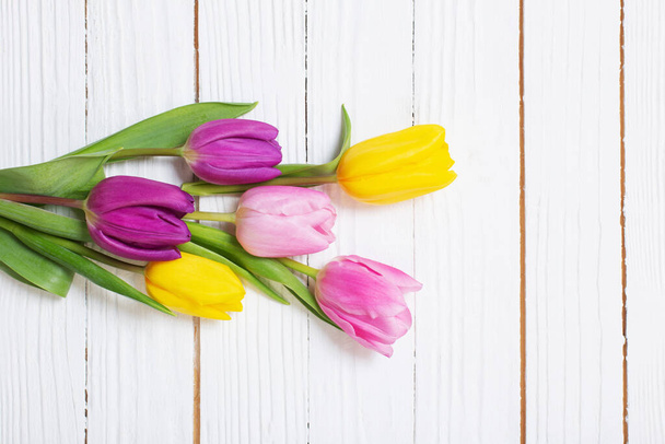 bouquet of tulips on white wooden background - Photo, Image