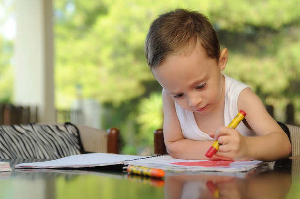 child drawing in a summer school - Фото, изображение