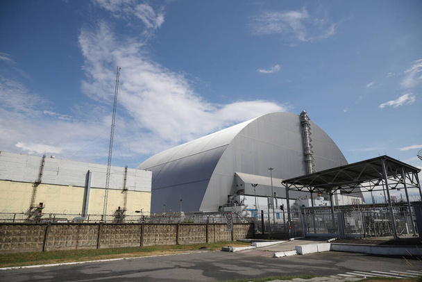 Central nuclear de Chernóbil en la zona de exclusión de Chernóbil, Chernóbil, Ucrania - Foto, Imagen