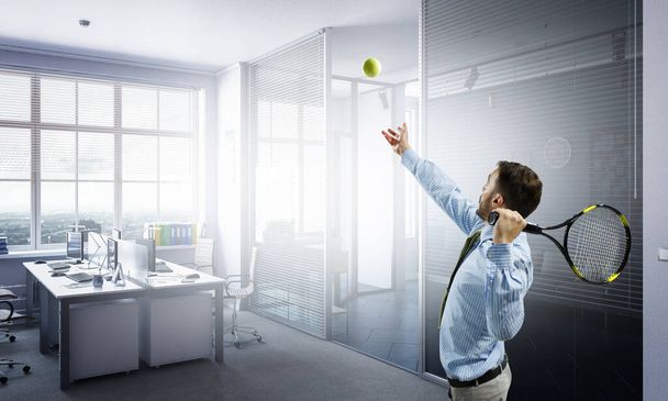 Businessman playing tennis . Mixed media - Фото, зображення