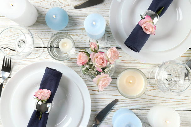 Beautiful table setting with aroma candles, top view - Photo, Image
