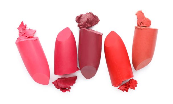 Different beautiful lipsticks on white background, top view - Foto, imagen
