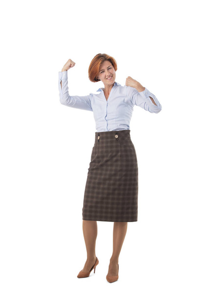 Full length portrait of happy business woman holding fists isolated on white background - Fotoğraf, Görsel