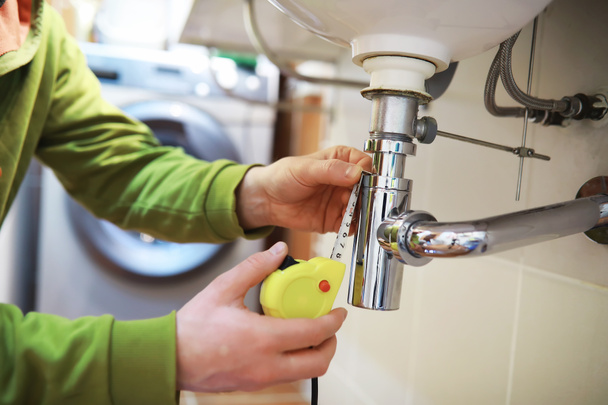 Plumbing repair. Sewer cleaning. Food grinder inspection repair. - 写真・画像