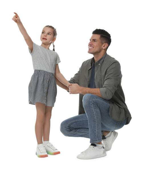 Little girl with her father on white background - Zdjęcie, obraz
