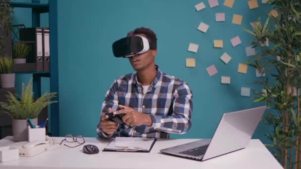 Modern man playing video games on vr goggles and console - Footage, Video