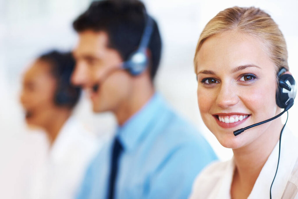 Service with smile. Closeup of professional female operator smiling at call center. - Фото, зображення