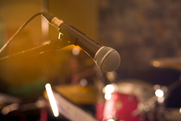microphone at concert hall with a blurred background with bokeh - Photo, Image