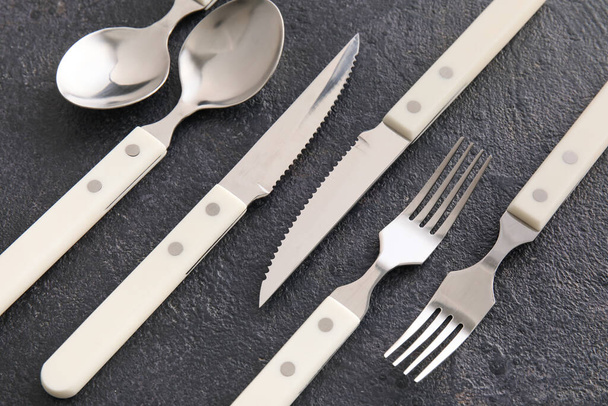 Elegant cutlery set on dark background - Foto, Imagem