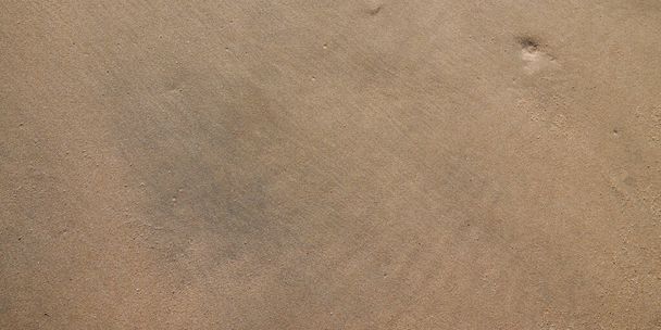faktura plaża piasek w lato słońce brązowy piaszczyste tło panoramiczny wzór fali dla web header panorama - Zdjęcie, obraz