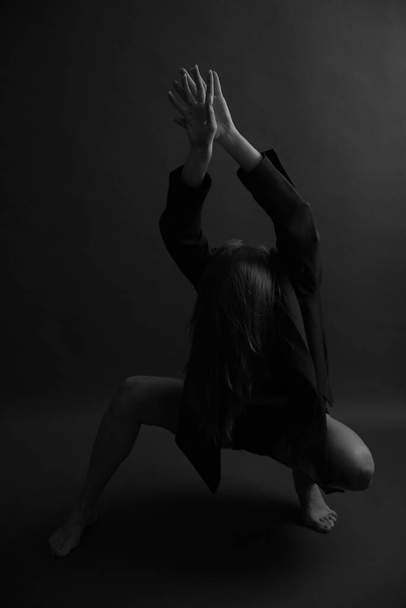 Blurred silhouette of a girl in underwear , soft focus gray background - Zdjęcie, obraz