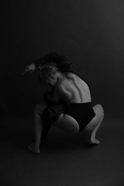 Sensual and sexy portrait, body detail art on a gray background - 写真・画像
