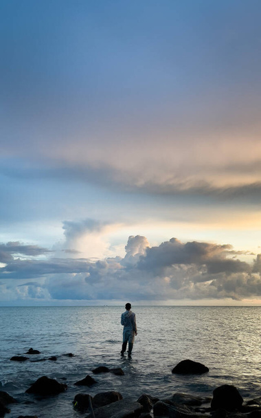 silhouette of a man on the beach - 写真・画像
