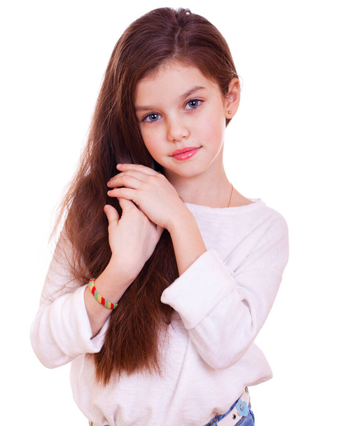 Portrait of a charming little girl, isolated on white background - Φωτογραφία, εικόνα